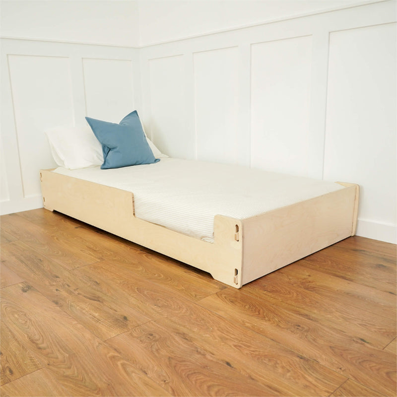 single floor bed with bedding