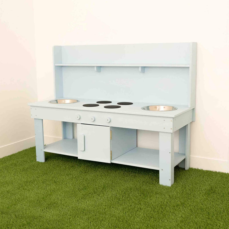 blue double mud kitchen with grass