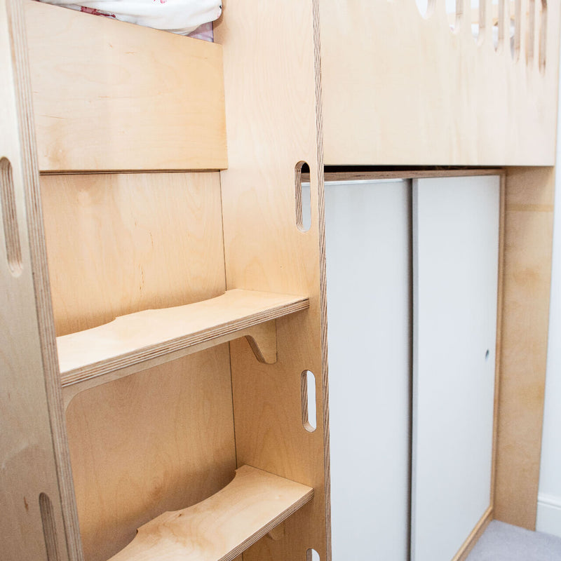 close up of steps and wardrobe on cabin bed