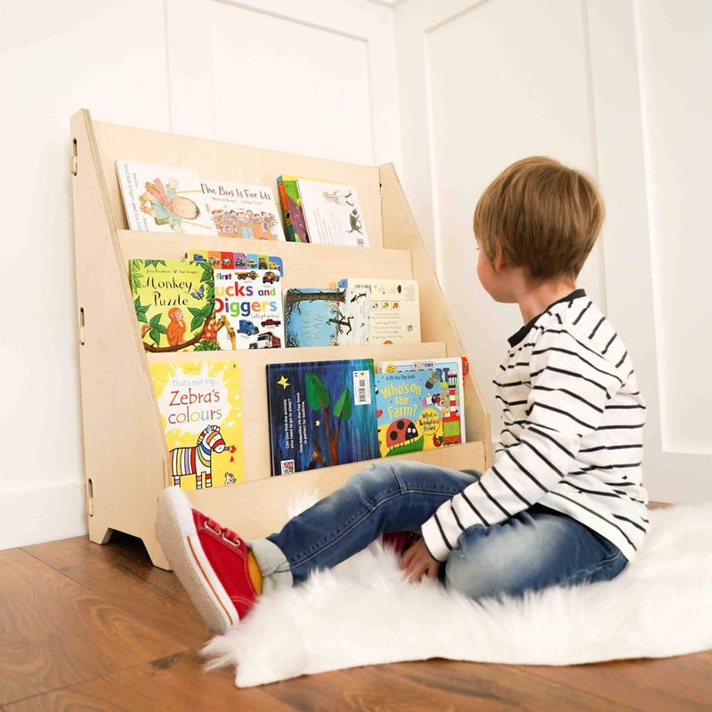 eco bookshelf with boy choosing a book to read
