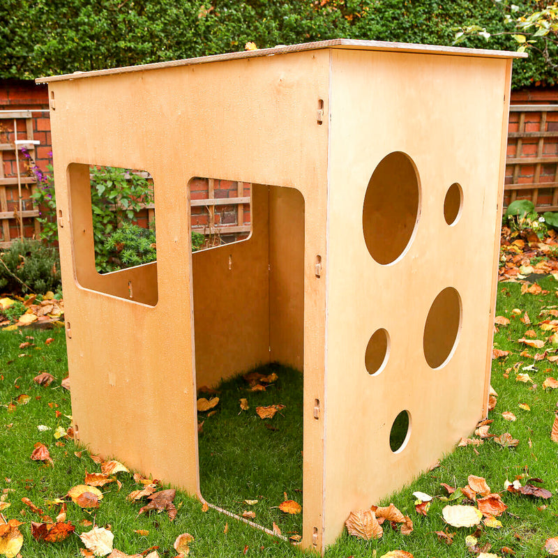 wooden playhouse in the garden